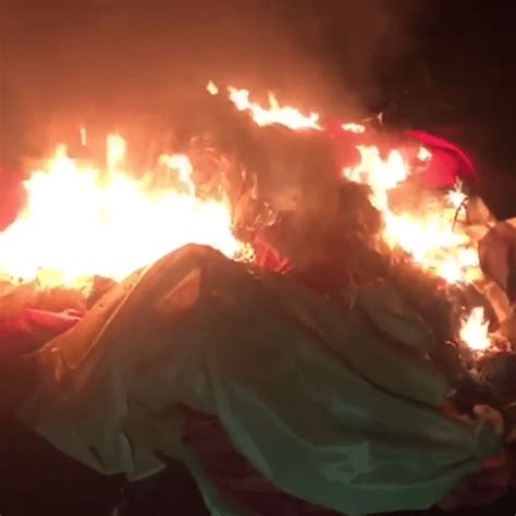 Watch as twisted Rangers 'ultras' torch stolen Partick Thistle flags ...