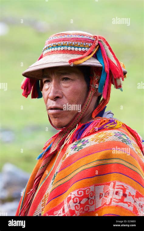 A portrait of a Quechua man in traditional native dress in the Lares ...