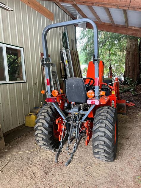 Kubota B7800 Tractor with Kubota LA402 and Digger Attachments and Maschio L52! | EstateSales.org