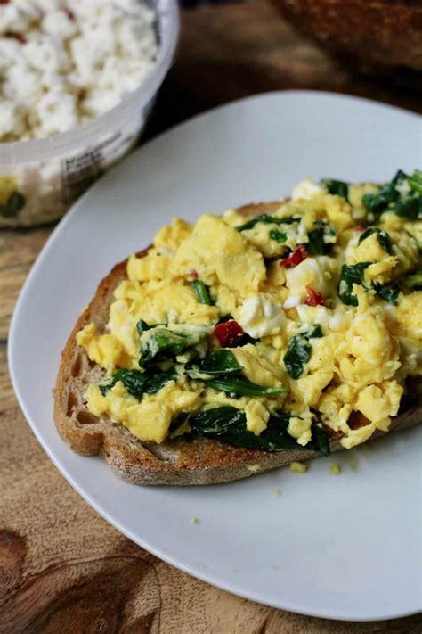 Cheesy Herbed Feta Scrambled Eggs with Spinach • The Healthy Toast