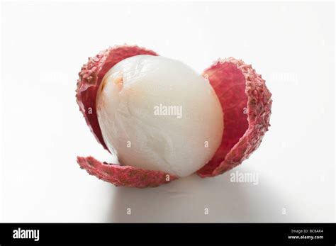 Lychee, with opened peel Stock Photo - Alamy