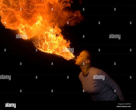 Female fire breather Stock Photo - Alamy