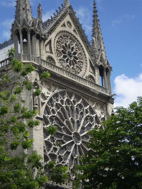 The rose window on the southern side of Notre-Dame de Paris. Rose Window, Monaco, Notre Dame ...