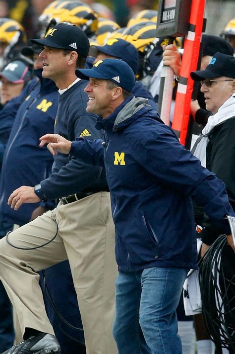 Harbaugh brothers! | Michigan football funny, Michigan sports, Michigan ...