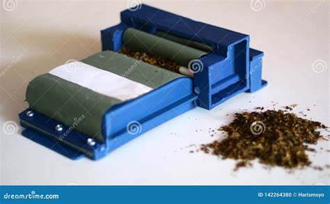 Cigarette Rolling Machine stock photo. Image of pack - 142264380