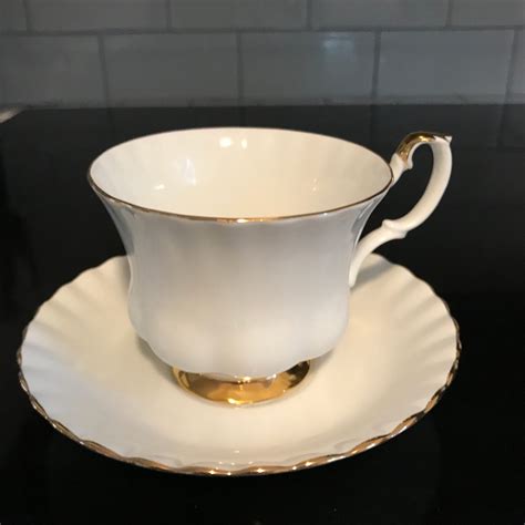 Royal Albert tea cup and saucer England Fine bone china White with gold trim farmhouse ...