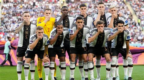 Germany players cover mouths for World Cup team photo | CTV News