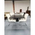 A set of 8 Scandinavian designer dining chairs and a matching extending dining table with 2 leaves