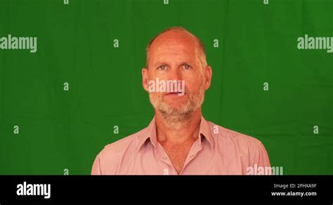 Bald man reacting disgusted, green screen, 4K medium shot Stock Video Footage - Alamy