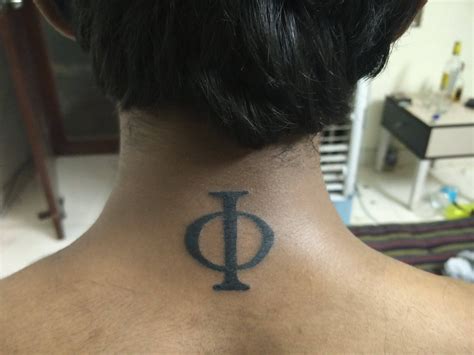 First tattoo - Phi symbol by Varun F1 Tattoo Lounge, Rajmouri Garden, New Delhi : r/ImagesOfIndia