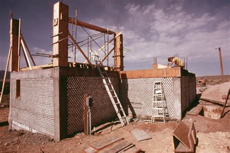 File:EXTERIOR OF AN EXPERIMENTAL ALL ALUMINUM BEER AND SOFT DRINK CAN HOUSE UNDER CONSTRUCTION ...