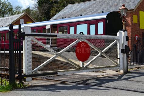 Railroad with Crossing Gate Stock Image - Image of crossing, fence ...