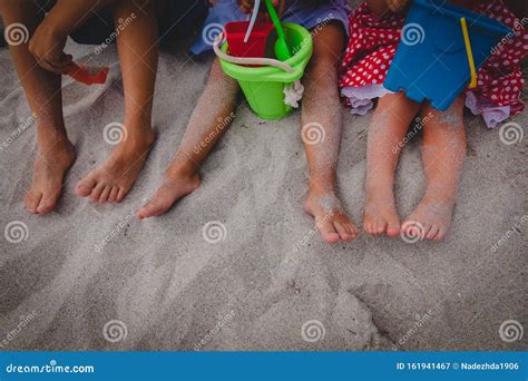 Kids Play with Toys on Beach, Family Feet in Sand Stock Image - Image ...