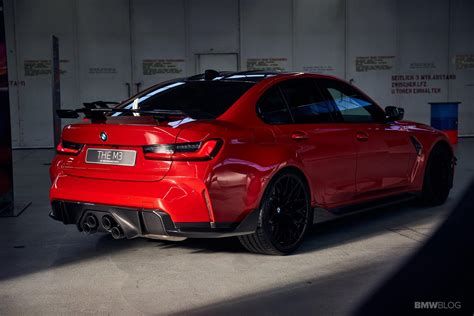 BMW M3 in Toronto Red and featuring carbon fiber accessories