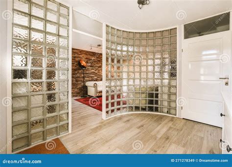 A Glass Enclosure in a Living Room with a Bed Stock Image - Image of modern, wood: 271278349