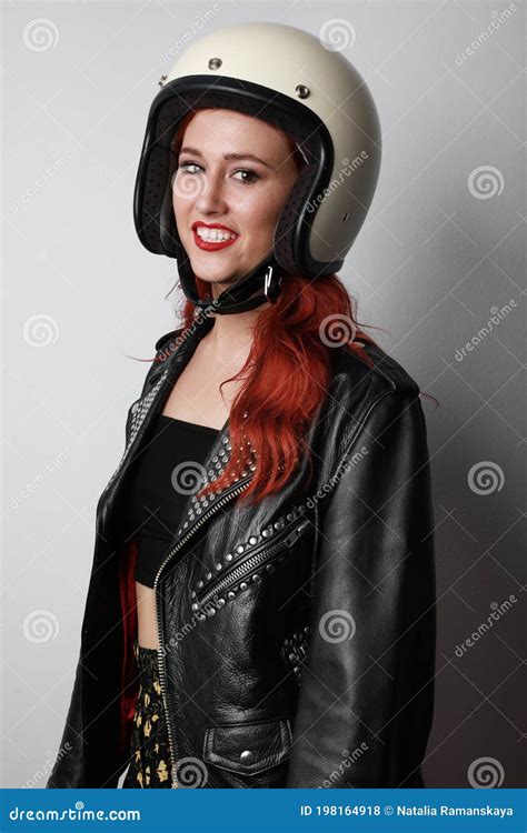 Vertical Headshot of Beautiful Woman with Biker Outfit, Posing Isolated Over White Wall. Stock ...