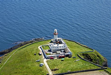 Galley Head Lighthouse in 40 miles west of Cork, Dun Deide headland, Ireland - lighthouse ...