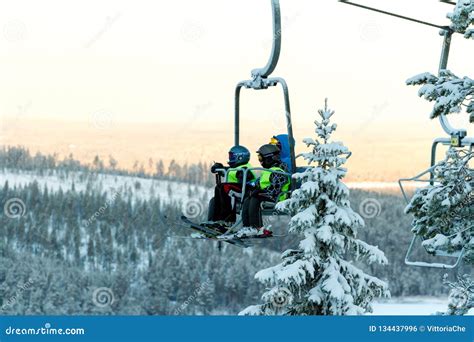 Ruka, Finland - November 27, 2012: Skiers are Sitting on the Chair Ski ...