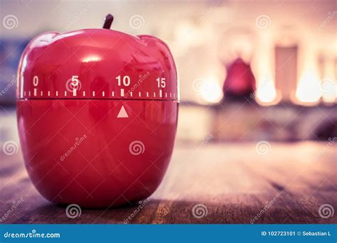 10 Minutes - Red Kitchen Egg Timer In Apple Shape On A Table Stock ...