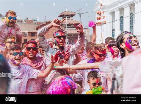 KATHMANDU, NEPAL - MARCH 6, 2023: Nepali People celebrating Happy Holi festival in Basantapur ...