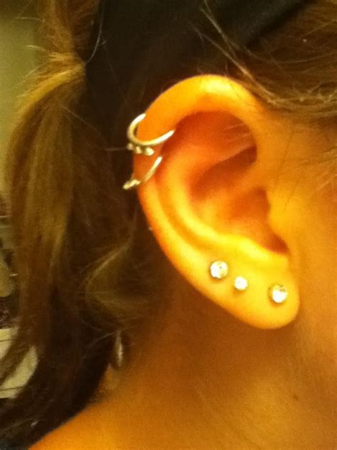 My ear.. I had to take one of those cartilage piercings out cause it got badly infected. Yeahh I ...