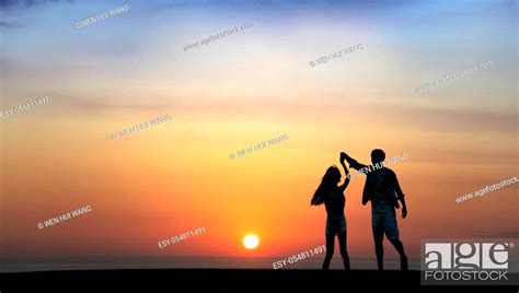 Happy Romantic young Couple dancing on the beach at sunset, Stock Photo, Picture And Low Budget ...