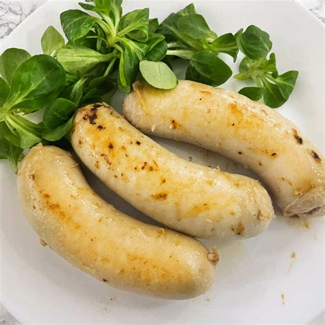 Cooking French white sausages (Boudin blanc)