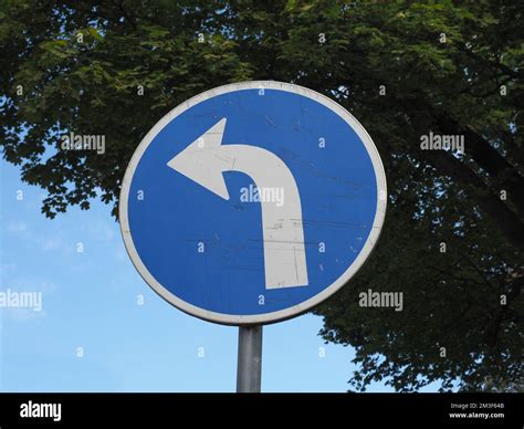 Regulatory signs, turn left ahead traffic sign Stock Photo - Alamy