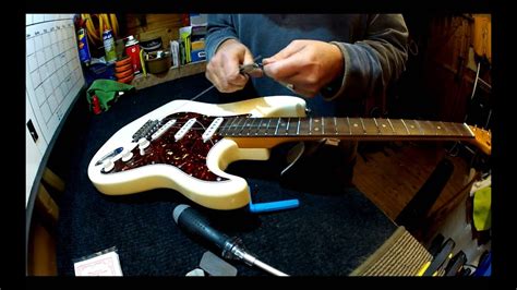 How to restring a strat style electric guitar - YouTube