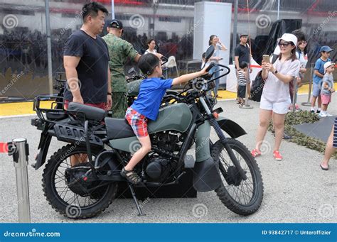 Visitors Exploring the Yamaha Tw200 Motorcycle at Army Open House 2017 in Singapore. Editorial ...