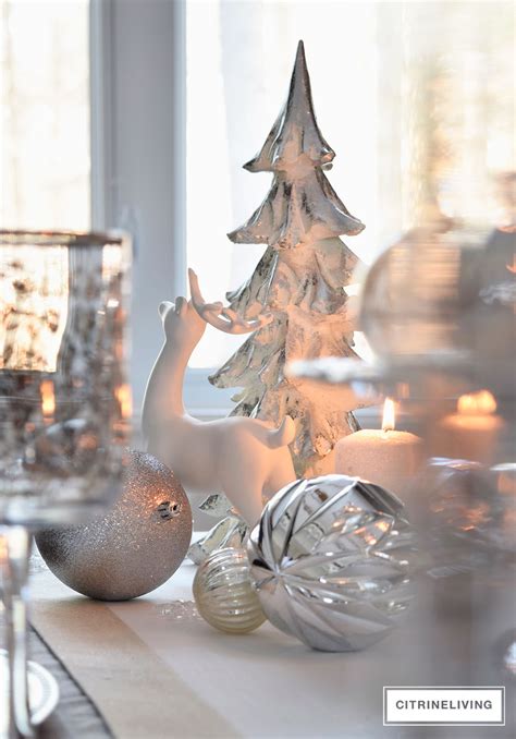 A WINTER WHITE AND SILVER HOLIDAY TABLESCAPE