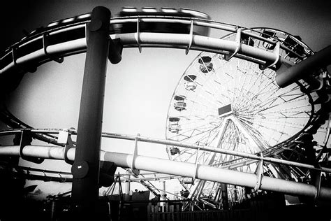 Amusement park rides on a pier Photograph by Celso Diniz | Pixels