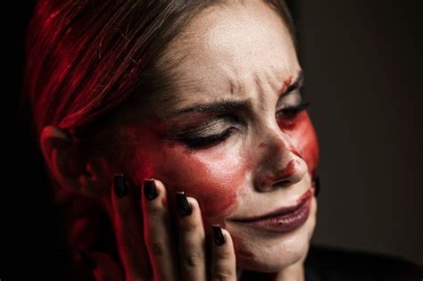 Free Photo | Portrait of woman with fake blood makeup