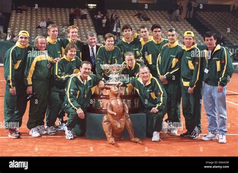 The Australian team with a blow-up kangaroo celebrate with the Davis ...