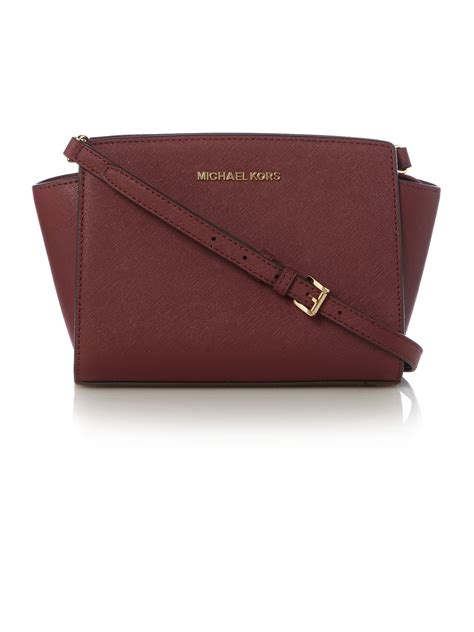 Michael kors Selma Burgundy Cross Body Bag in Purple | Lyst