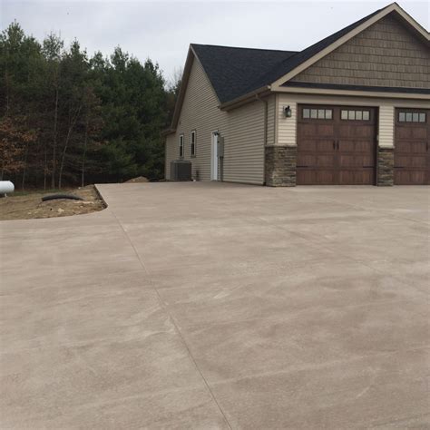 Colored Concrete Driveway and Stamped Concrete Sidewalk