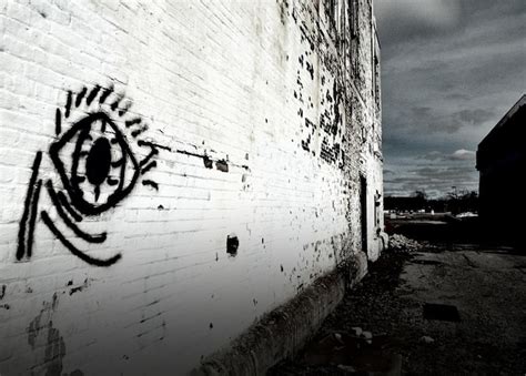 Premium Photo | Eye graffiti on wall