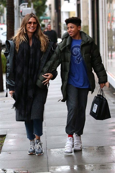 Heidi Klum braves the wet weather to go shopping with son Henry | Daily ...