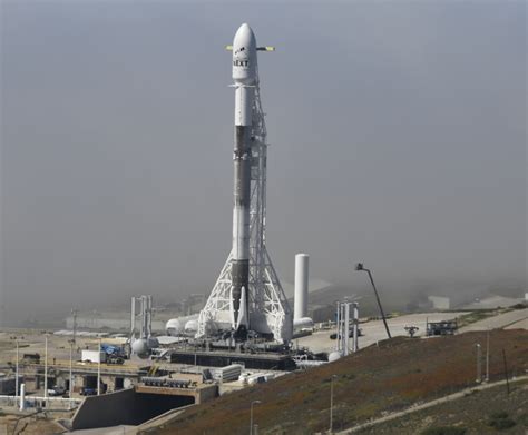 Photos: Falcon 9 rocket stands vertical at Vandenberg – Spaceflight Now