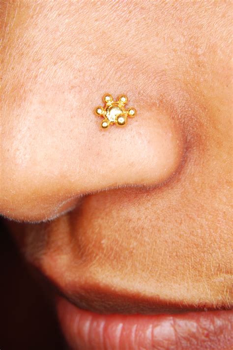 File:Nose piercing gold stud.jpg - Wikimedia Commons