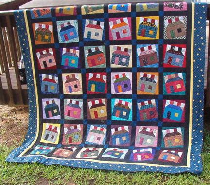 Happy Scrappy Houses Quilt | FaveQuilts.com