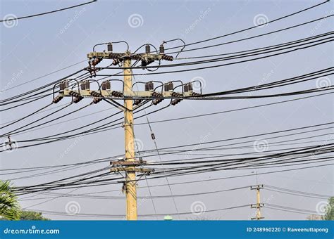 Electric poles and wires stock photo. Image of cable - 248960220