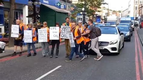 Just Stop Oil: Protesters are shoved by members of the public during London slow march | Sky News