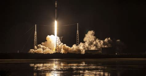 SpaceX launches latest batch of internet satellites, including one with a visor - The Verge