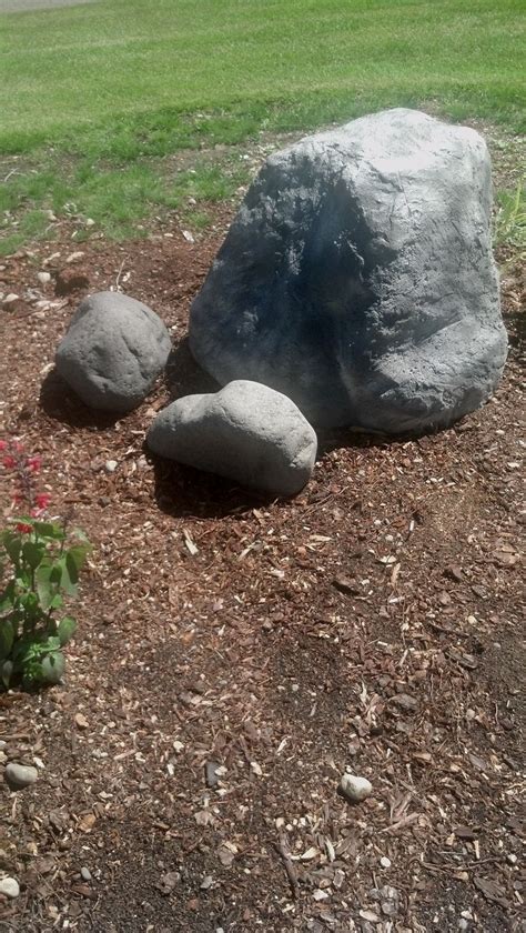 Fake boulder I created from cardboard boxes, newspaper and chicken wire. Cover in mortar and ...