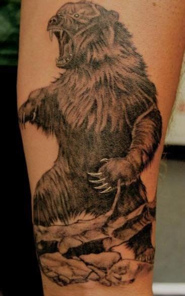 Roaring Bear Tattoo Beautiful roaring bear tattoo standing on upper ... | Bear tattoo designs ...