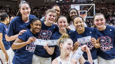 UConn women's basketball team records 100th consecutive win - CBS News