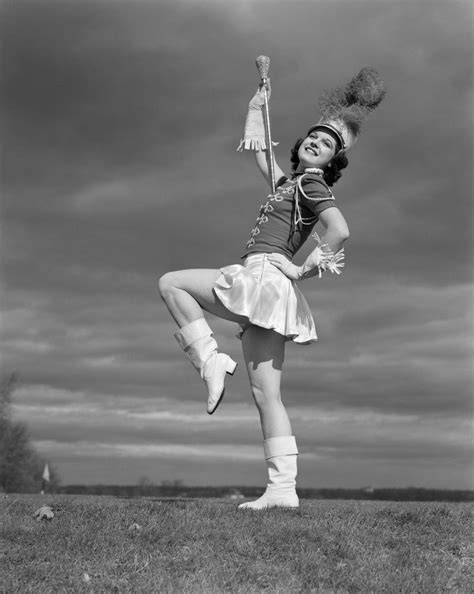 1940s Woman Drum Major In Majorette Band Uniform Twirling Baton posters ...