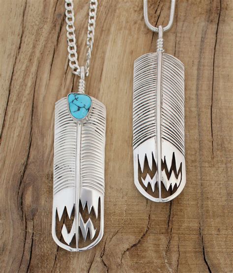 Sterling Silver Feather Pendant with Turquoise Stone