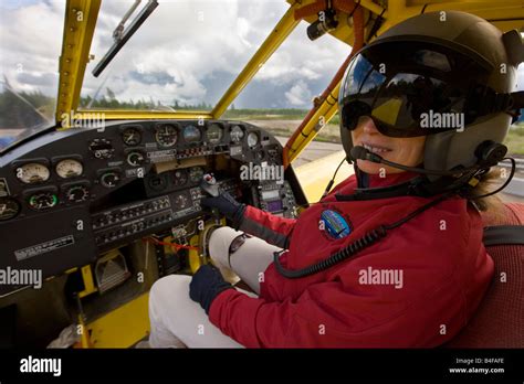 Michelle in the cockpit of the Air Tractor, AT-802, Red Lake, Ontario, Canada. Model Released ...